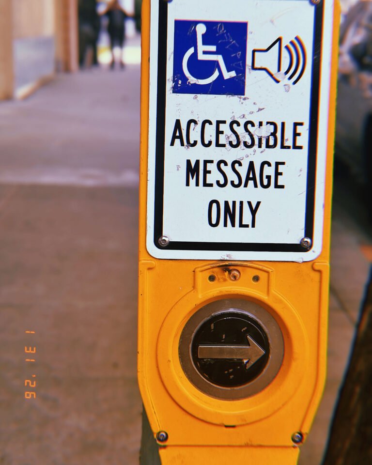 pedestrian crossing button with accessible message sign