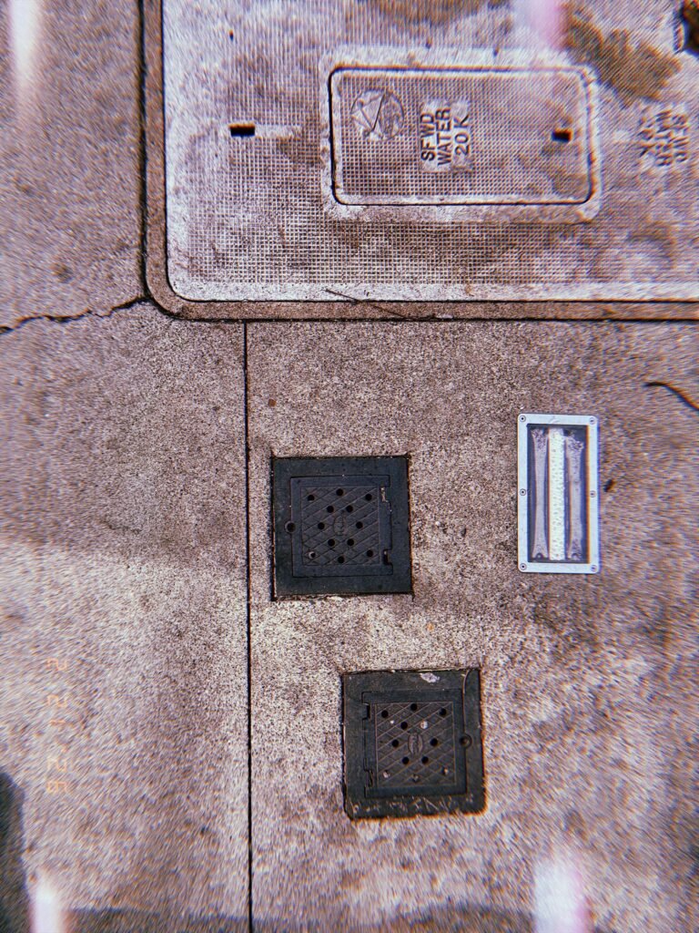 sidewalk utility access covers and embedded reflective marker