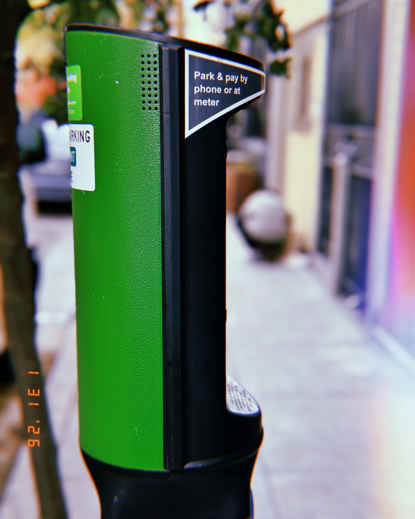 parking payment meter installed on city sidewalk