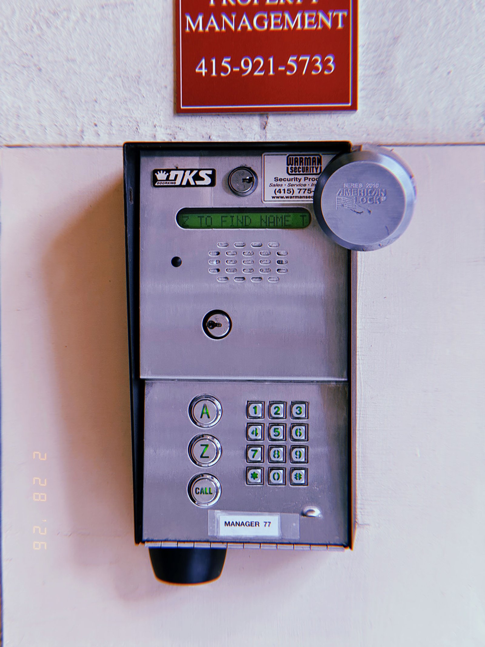 building access control intercom with keypad and call buttons mounted on wall